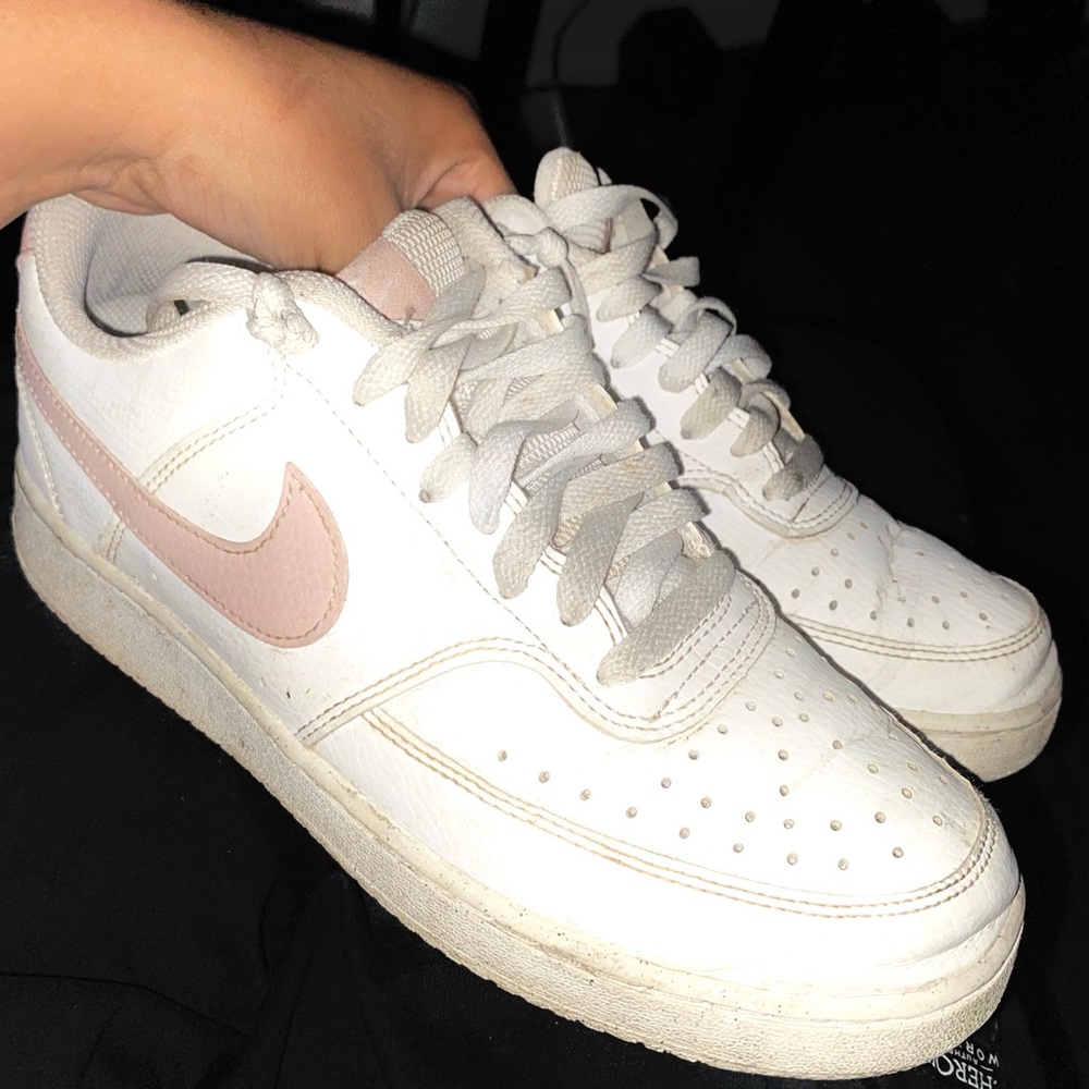 White air forces with a pink swoosh